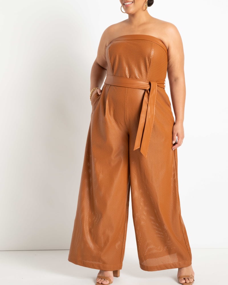 Front of a model wearing a size 14 Kara Strapless Faux Leather Jumpsuit in Argan Oil by ELOQUII. | dia_product_style_image_id:236360